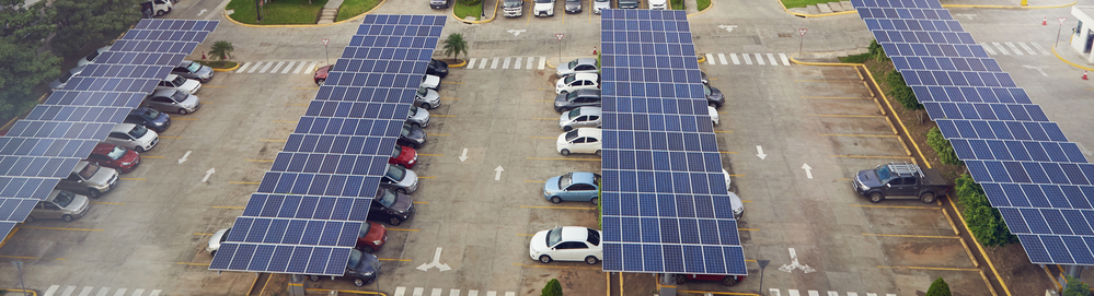 Krav på solpaneler över parkerings-platser